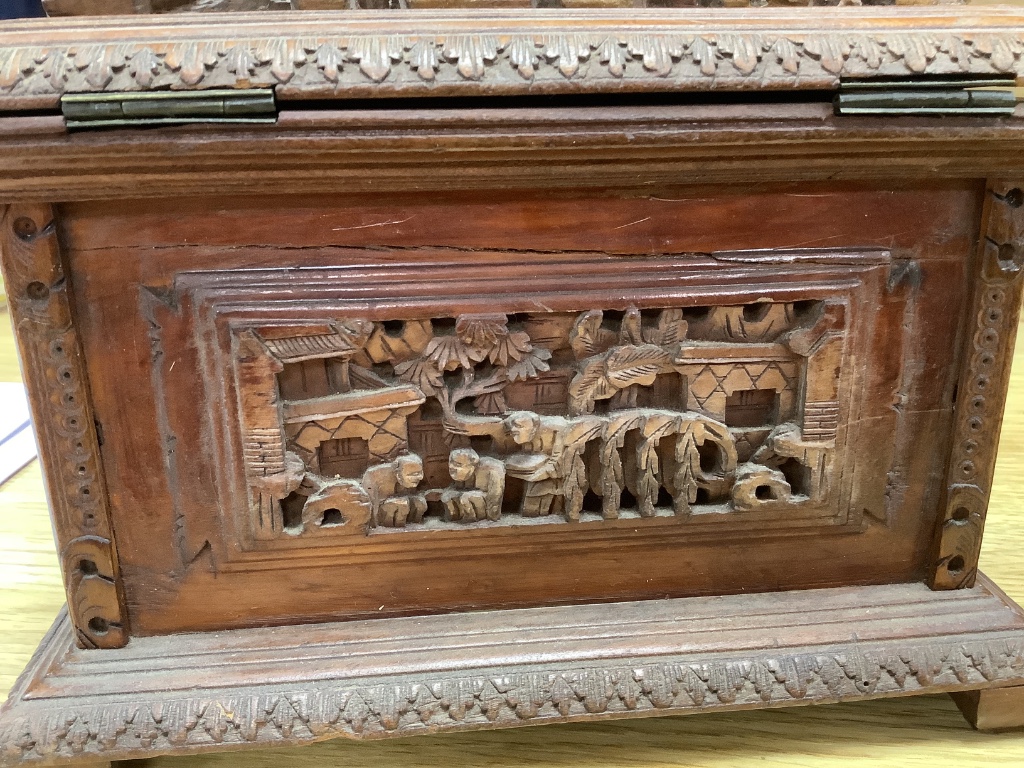 Three 19th century Chinese carved sandalwood caskets, longest 19cm